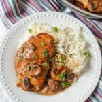 Chicken and rice on a plate.