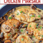 Chicken marsala in a skillet.