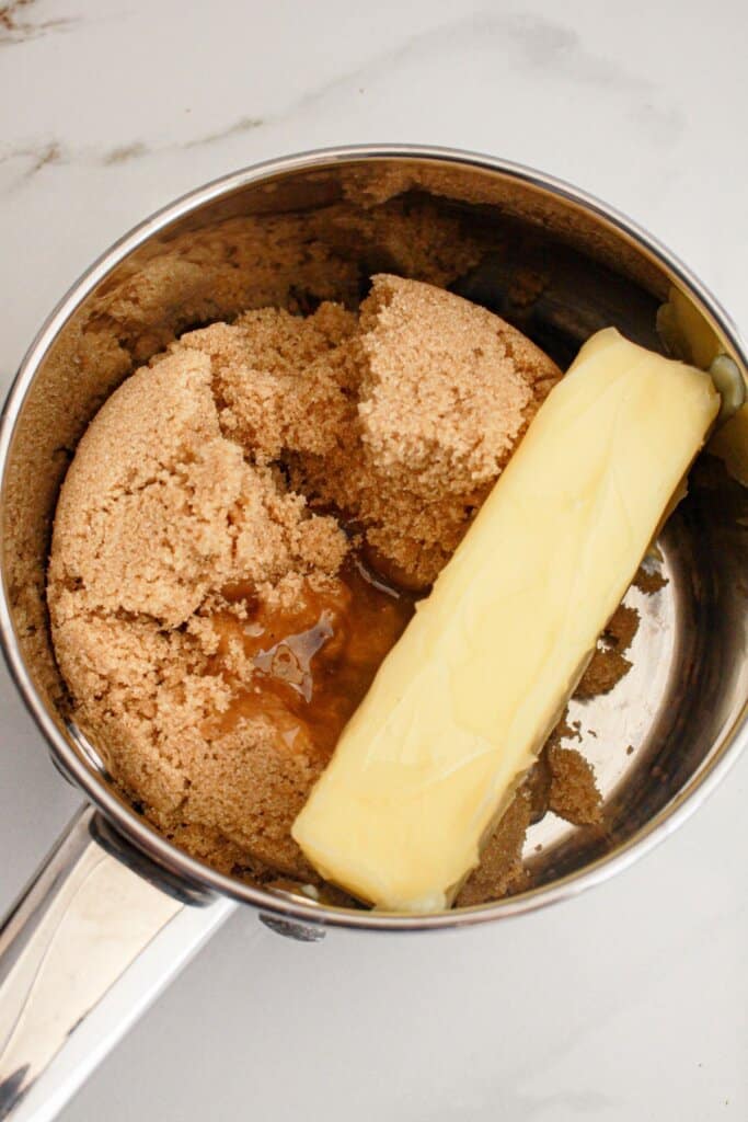 Butter and brown sugar in a saucepan.