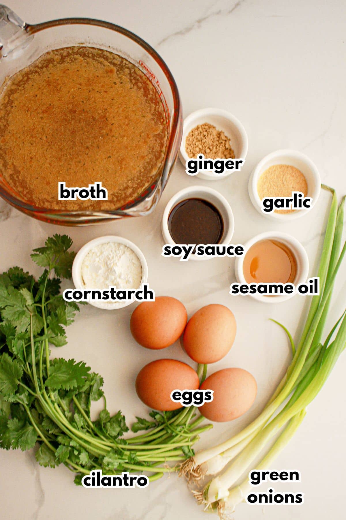 Bowls of ingredients on a counter ready to cook.