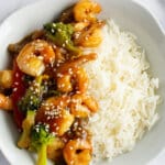 Bowl of honey garlic shrimp and rice.