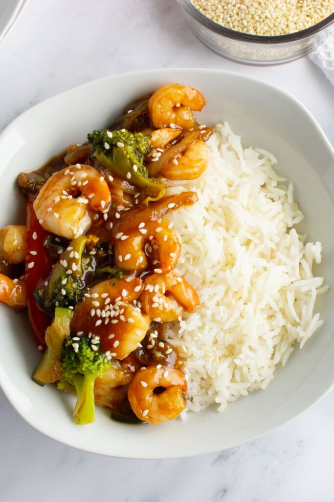 Bowl of honey garlic shrimp and rice.