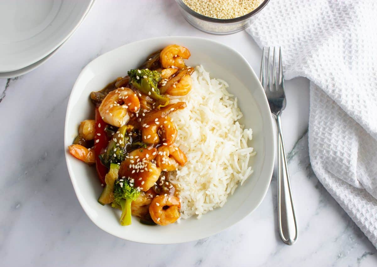 Bowl of honey garlic shrimp and rice.