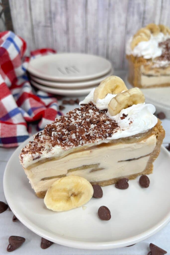 Slice of banoffee on a plate.