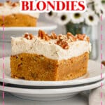 Slice of carrot cake blondie on a plate.