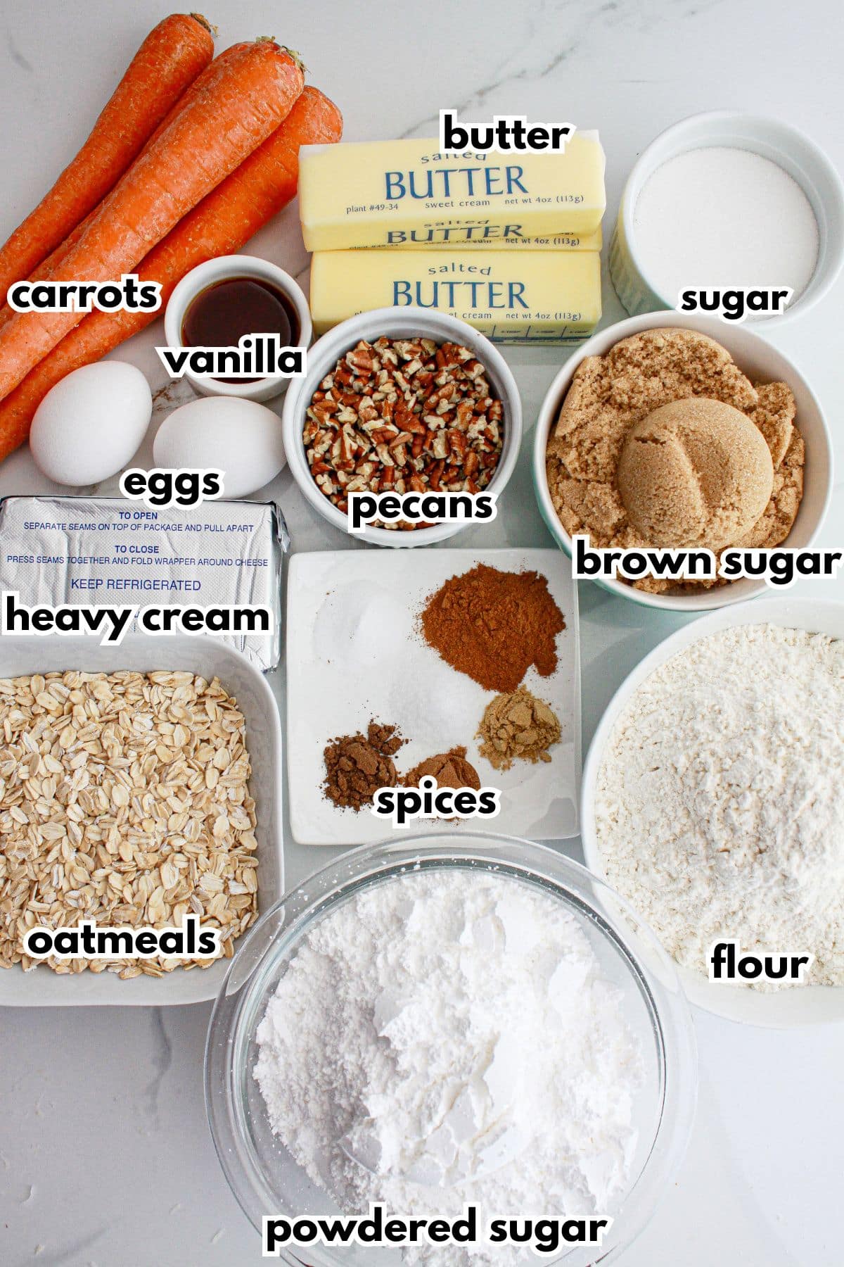 Bowls of ingredients labeled with text on a counter.