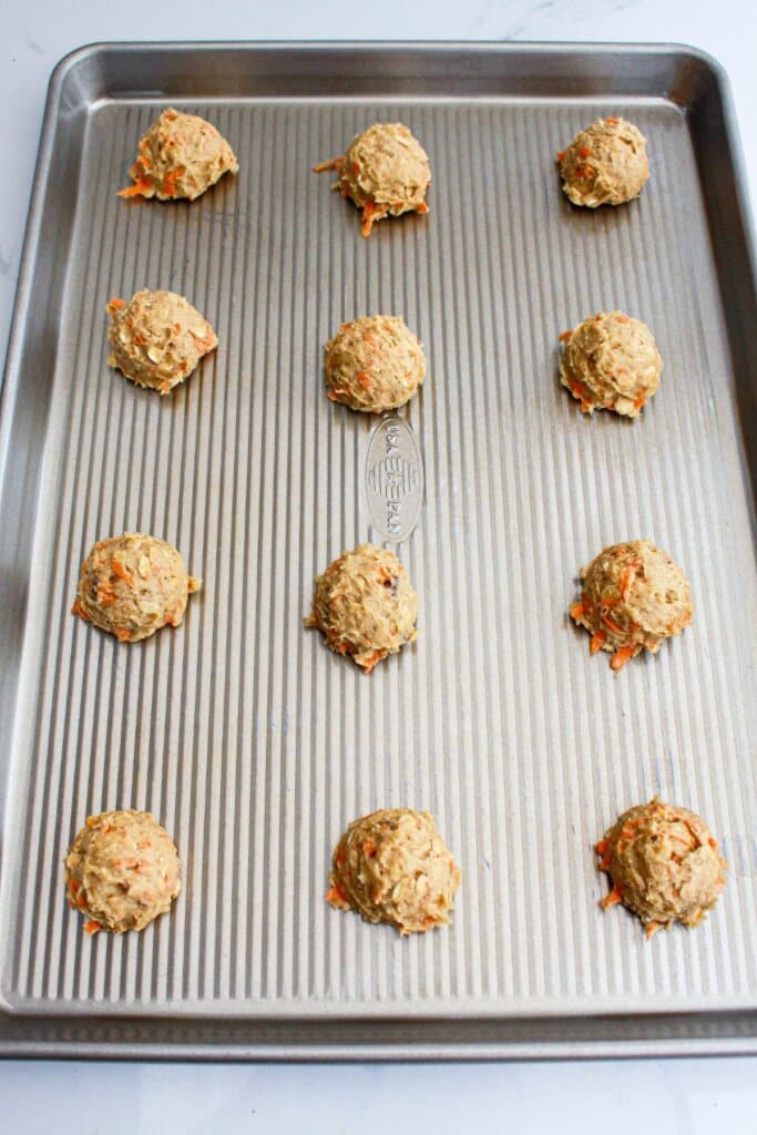 Dough balls on a baking sheet.