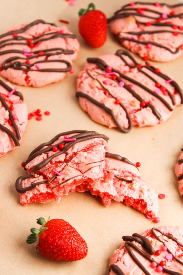 Choccolate covered strawberry cookies on a table.