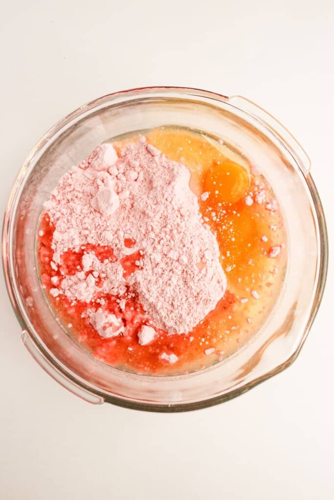 Cake mix, egg, and oil in a large glass mixing bowl.