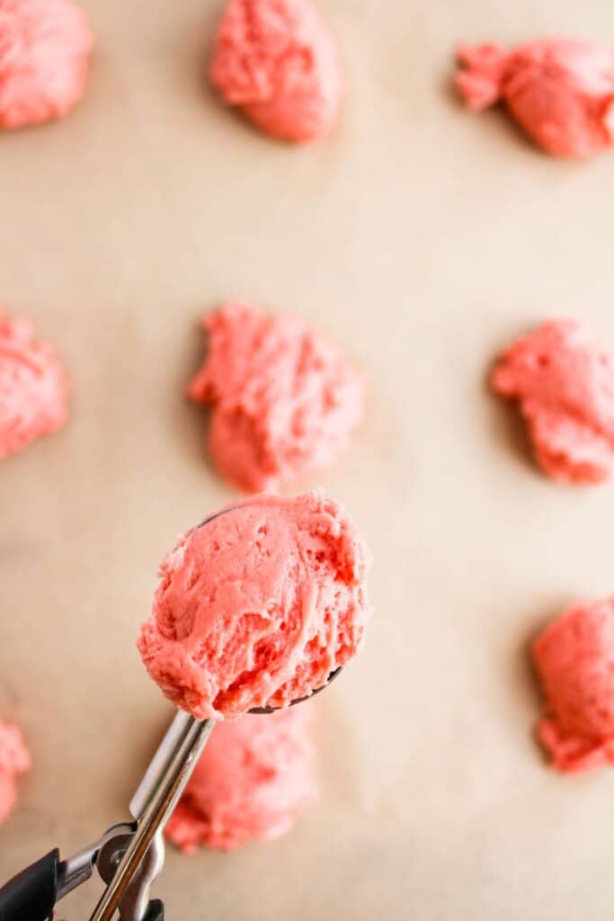 Cookie dough in a cookie scoop.