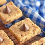 Peanut butter bars on a cooling rack.