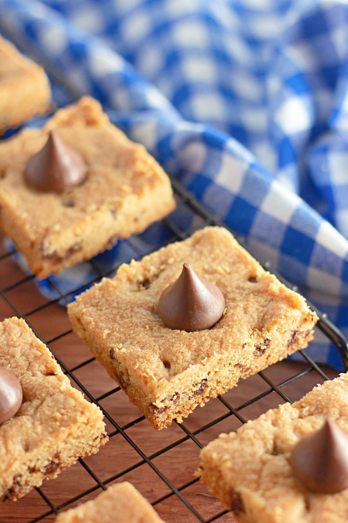 Peanut butter bars on a cooling rack.