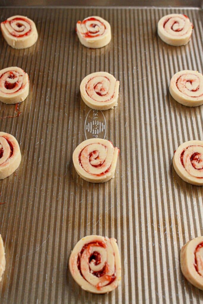 Cookies on a baking tray ready for the oven.