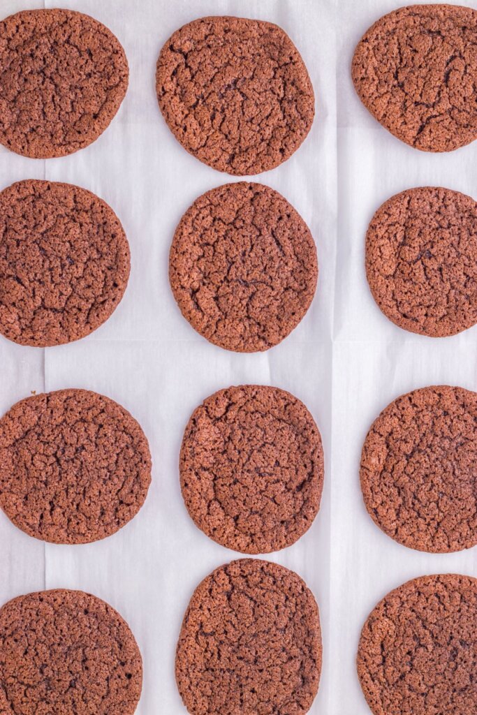 Chocolate cookies on a baking sheet.