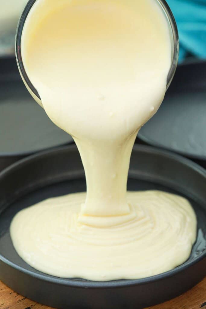 Batter being poured into baking dish.