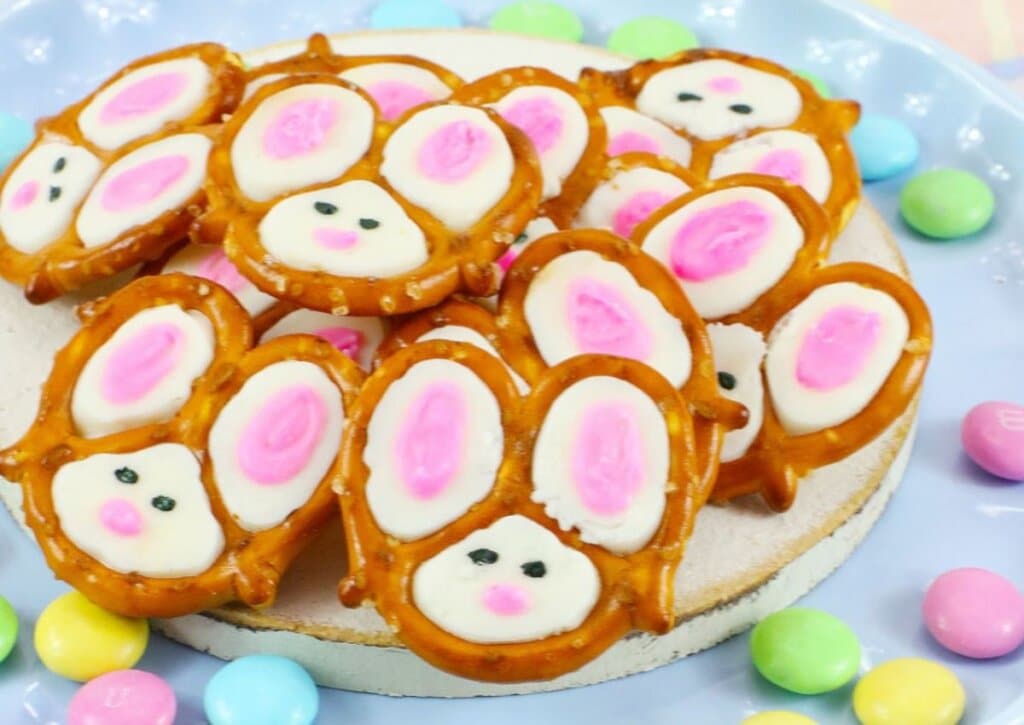 Bunny pretzels on a blue plate.
