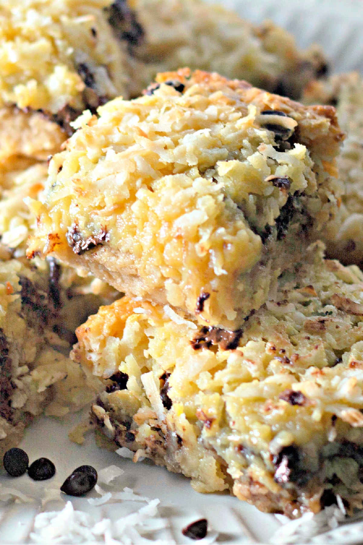 Coconut butter bars stacked on top of each other.