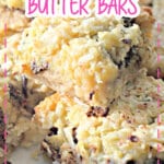 Coconut butter bars stacked on top of each other.