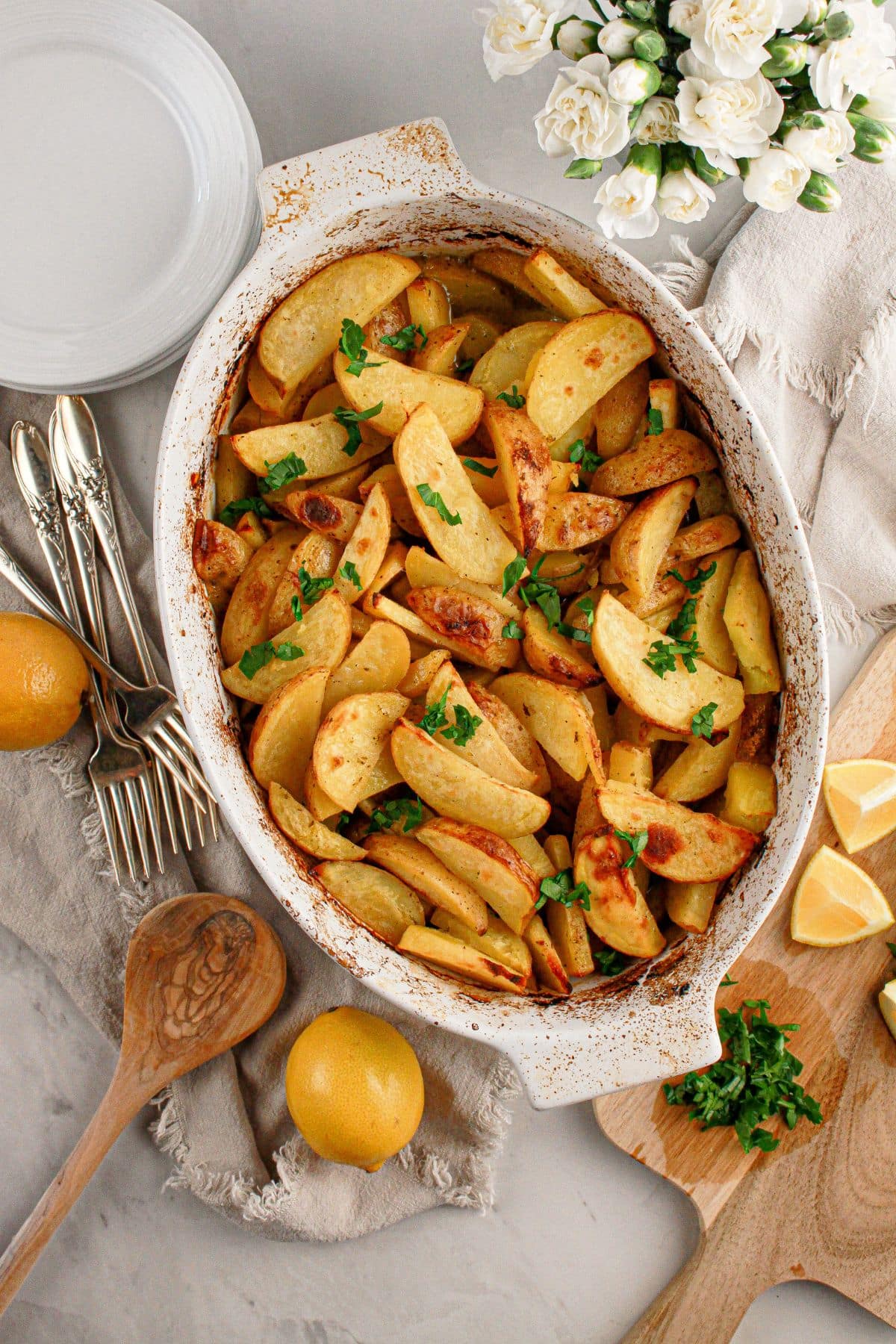 Casserole dish full of roasted potatoes.
