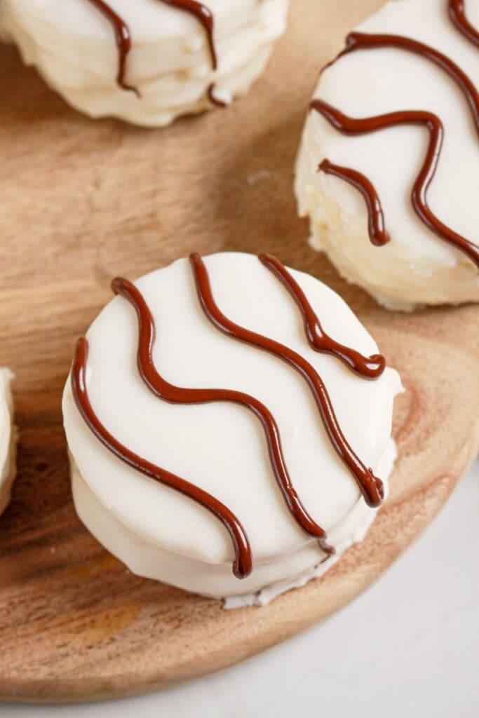 Homemade zerba cakes on a wooden cutting board.
