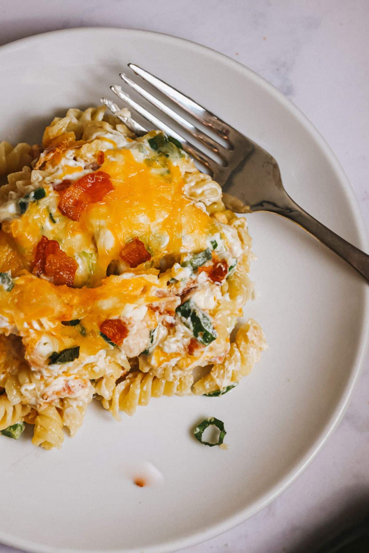 Serving of jalapeno popper chicken pasta on a plate.