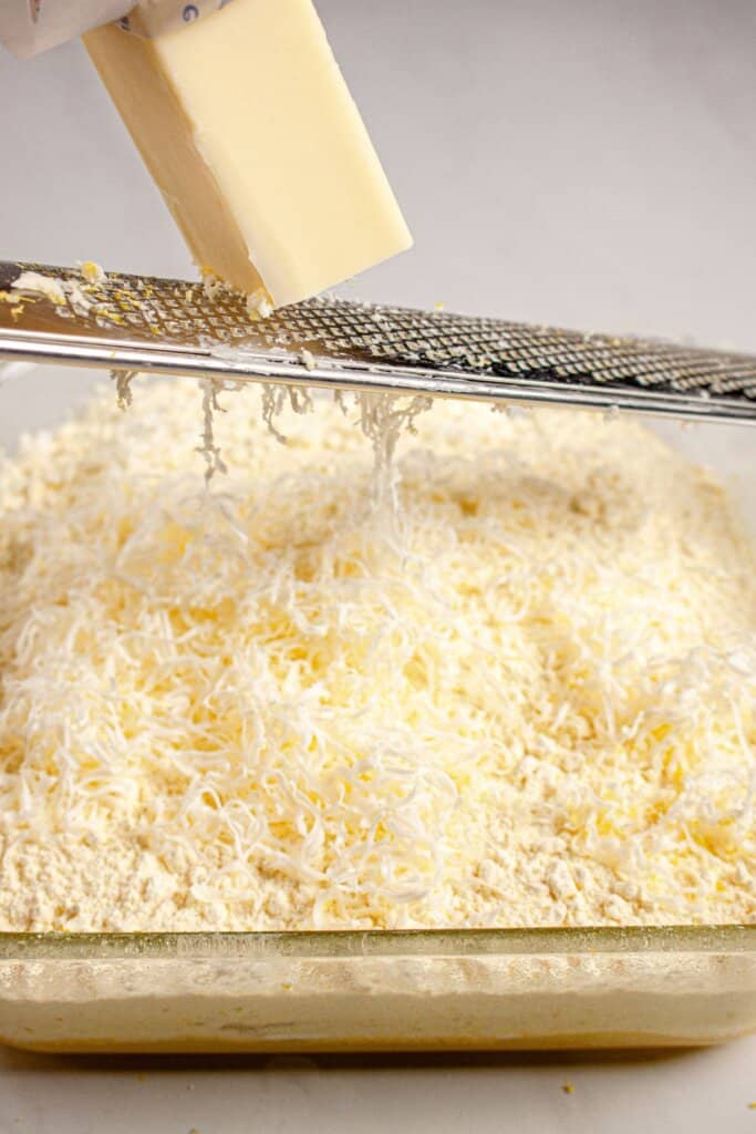Butter being grated.