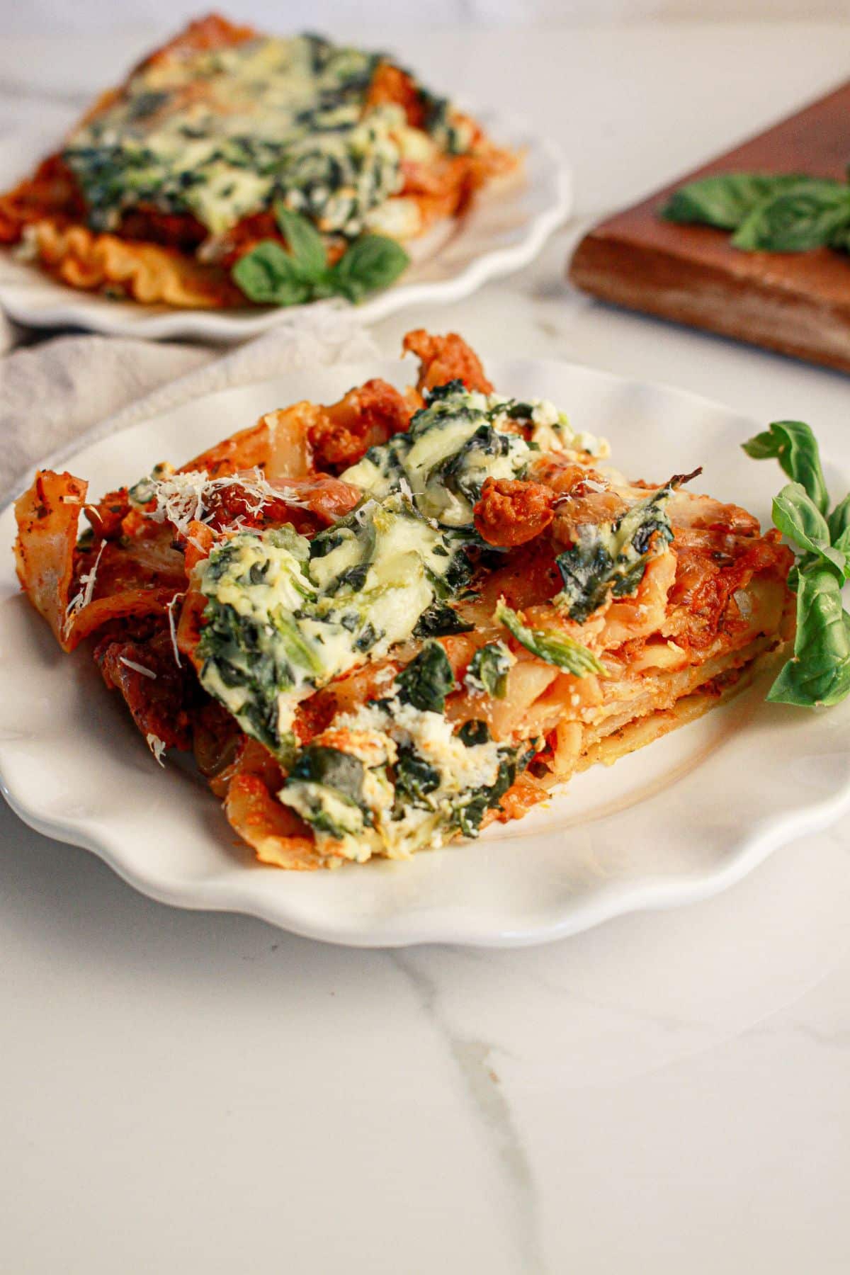 Slice of sheet pan lasagna on a plate.