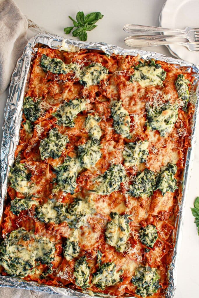 Baked sheet pan lasagna on a counter.