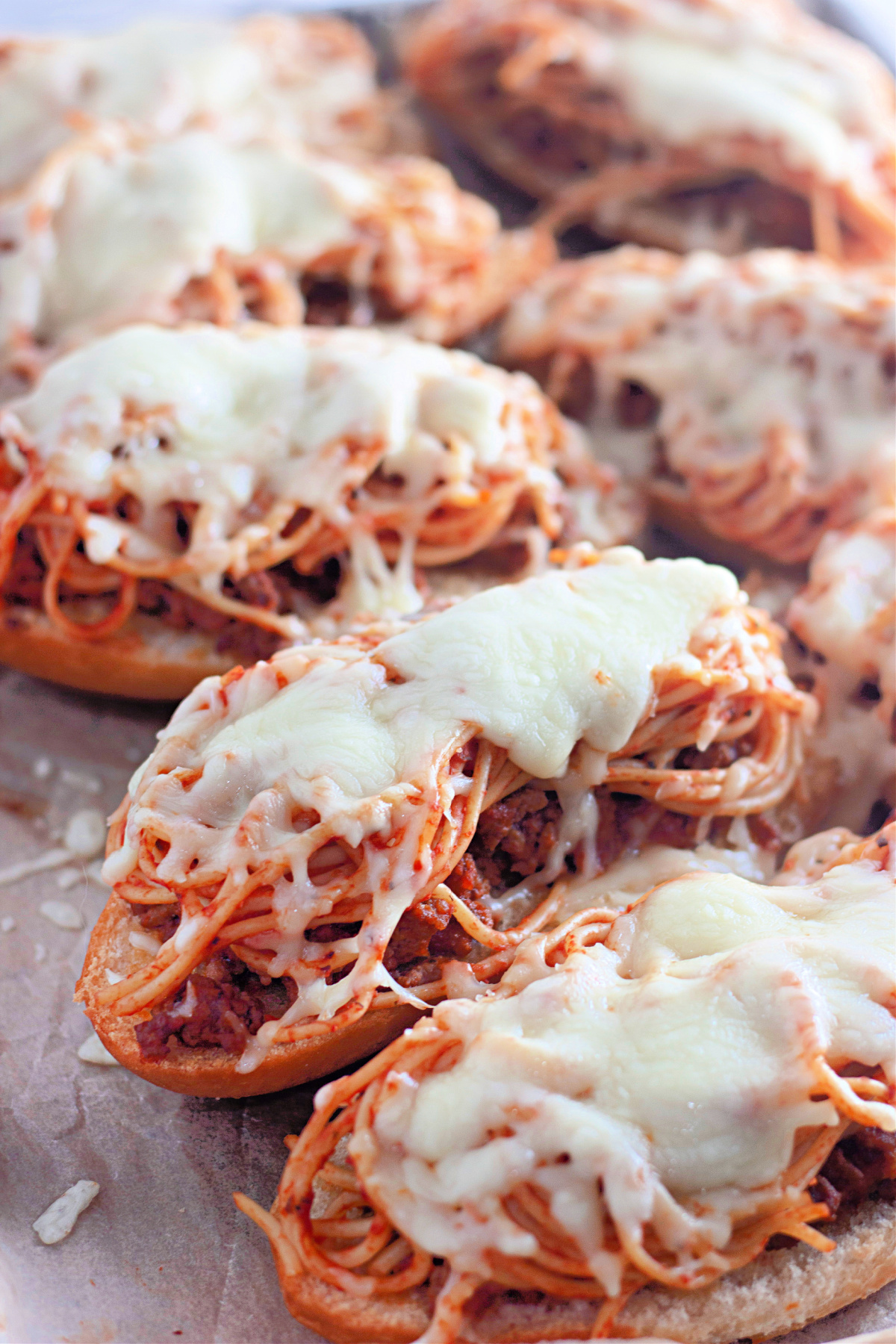 Spaghetti bread on a baking sheet.