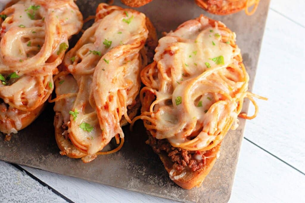 Spaghetti bread on a baking sheet.