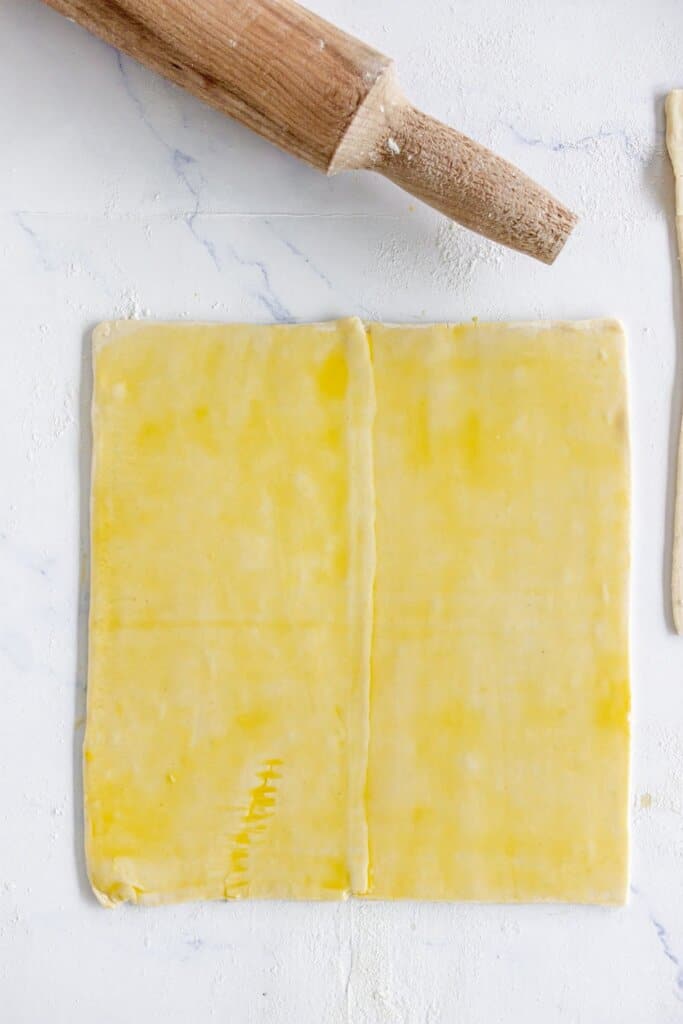Egg was brushed on top of puff pastry.