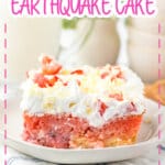Slice of strawberry earthquake cake on a plate.
