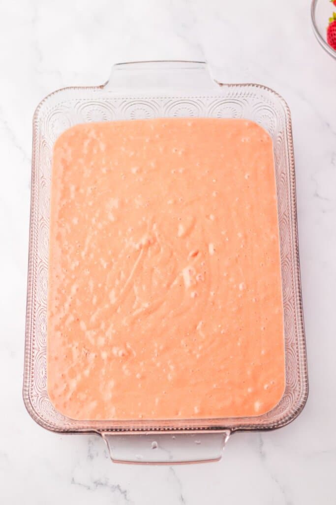 Batter in a glass baking dish.