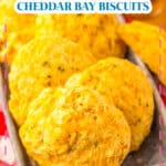 Cheddar bay biscuits in a metal serving tray.
