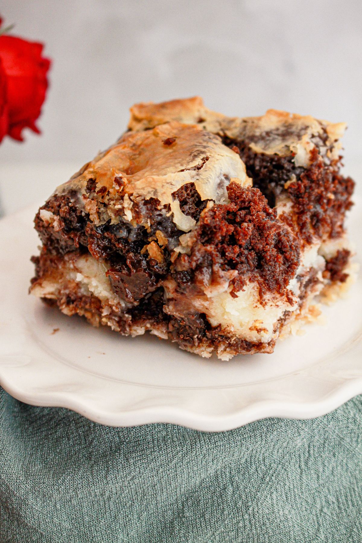Slice of earthquake cake on a plate.