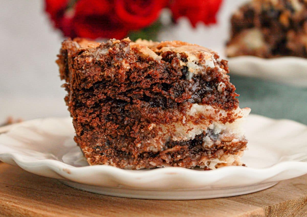 Slice of earthquake cake on a plate.