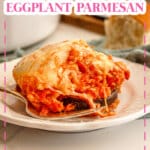 Serving of eggplant parmesan on a plate.