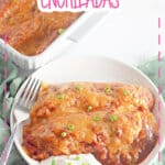 Two ground beef enchiladas on a plate.