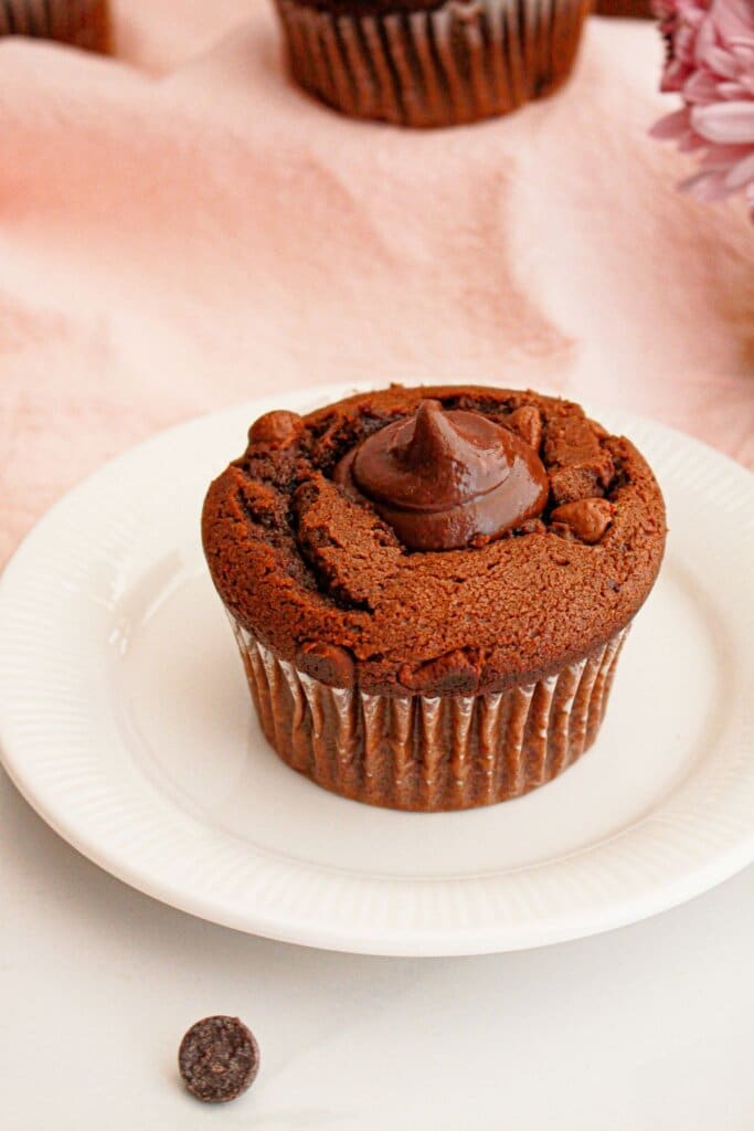 Olympic village muffin on a small plate.