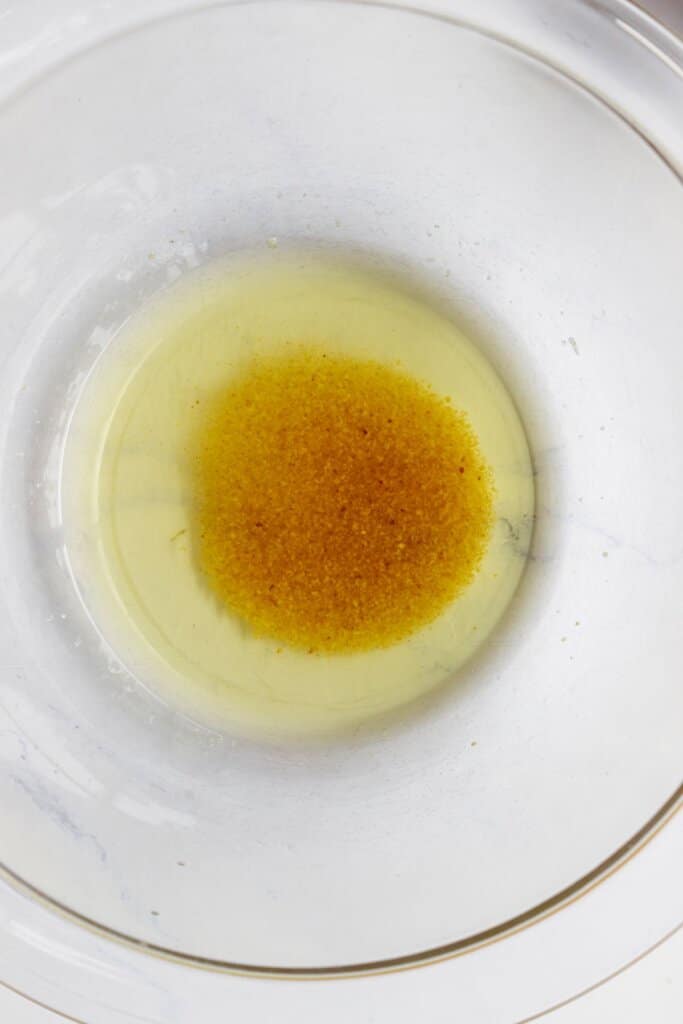 Brown butter in a large glass bowl.
