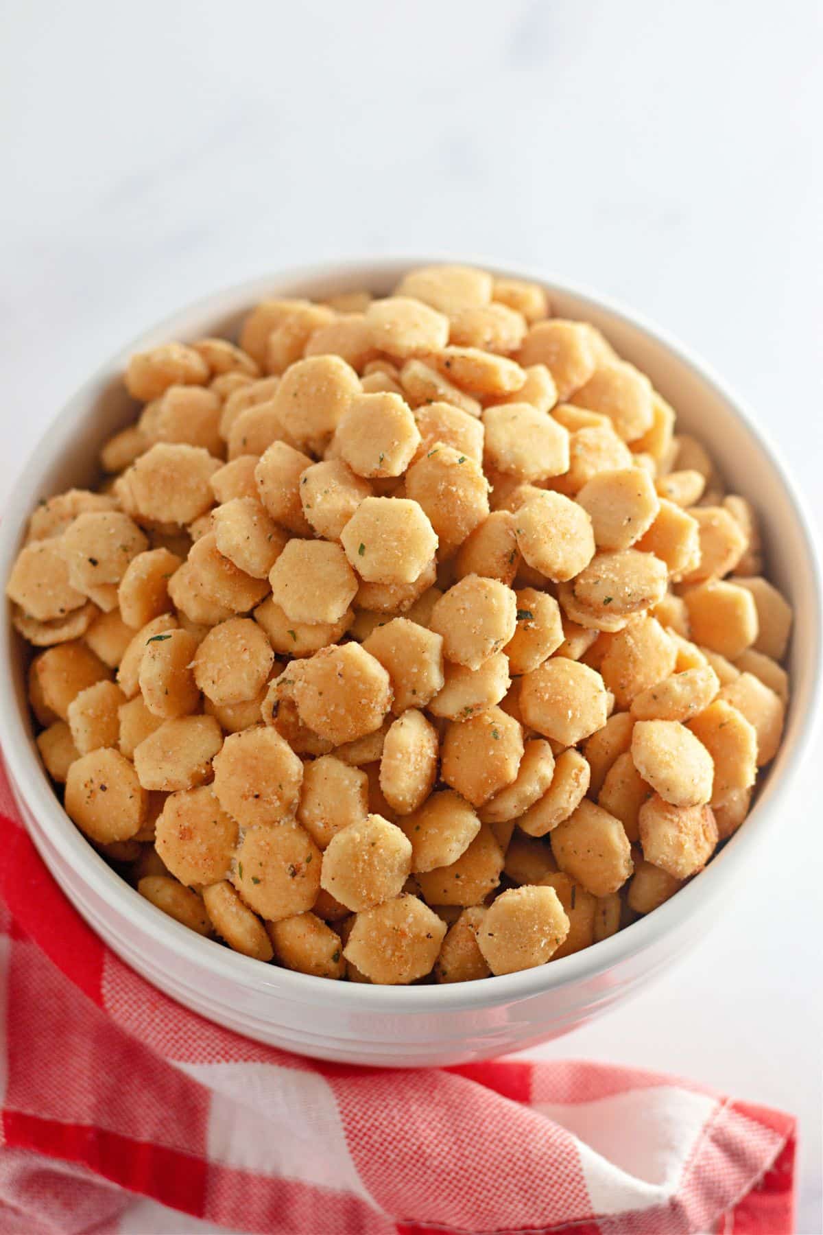 Ranch oyster crackers in a white mixing bowl.