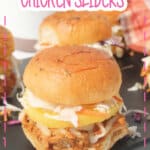 Teriyaki chicken sliders on a cutting board.