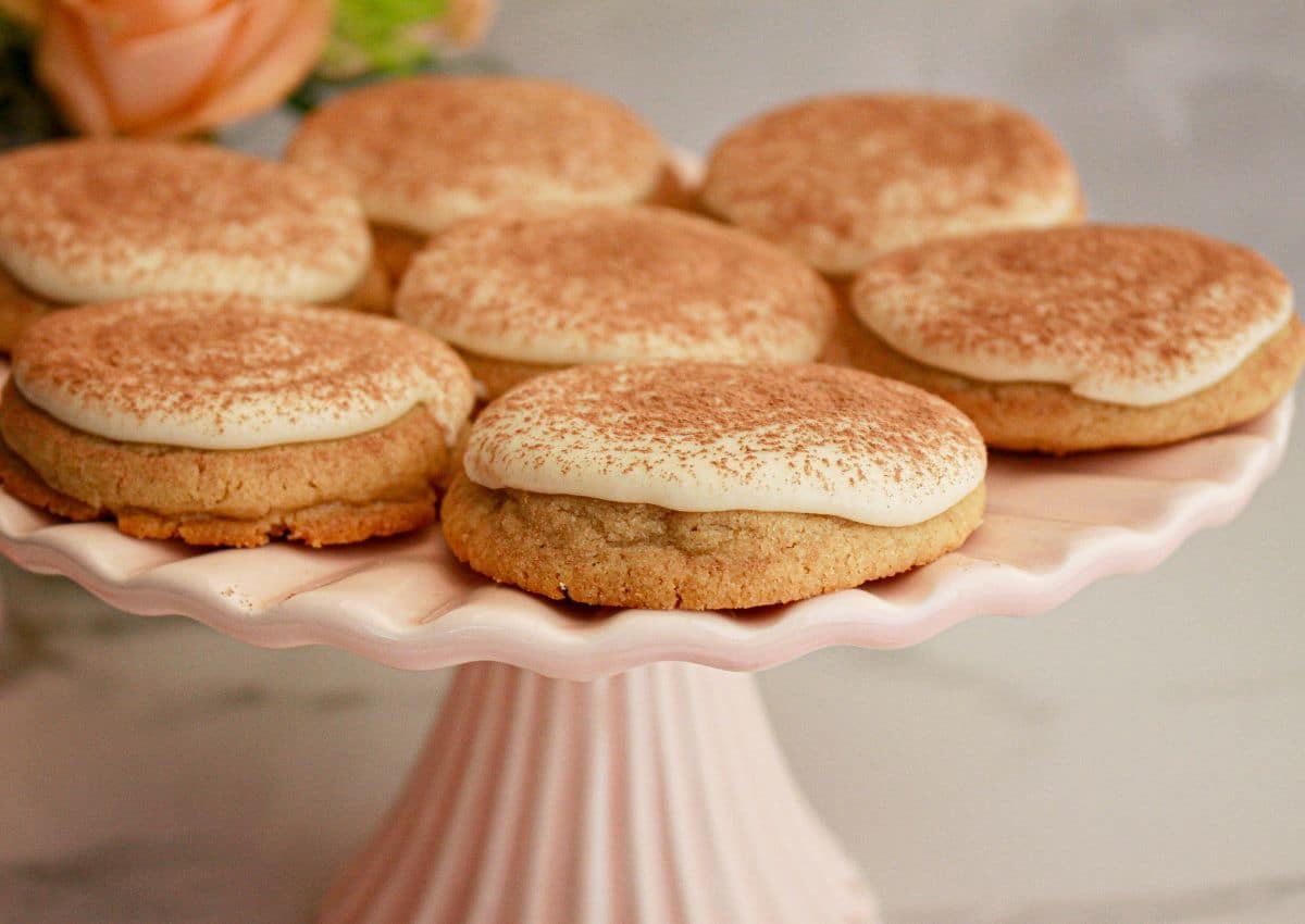 Tiramisu cookes on a cake stand.