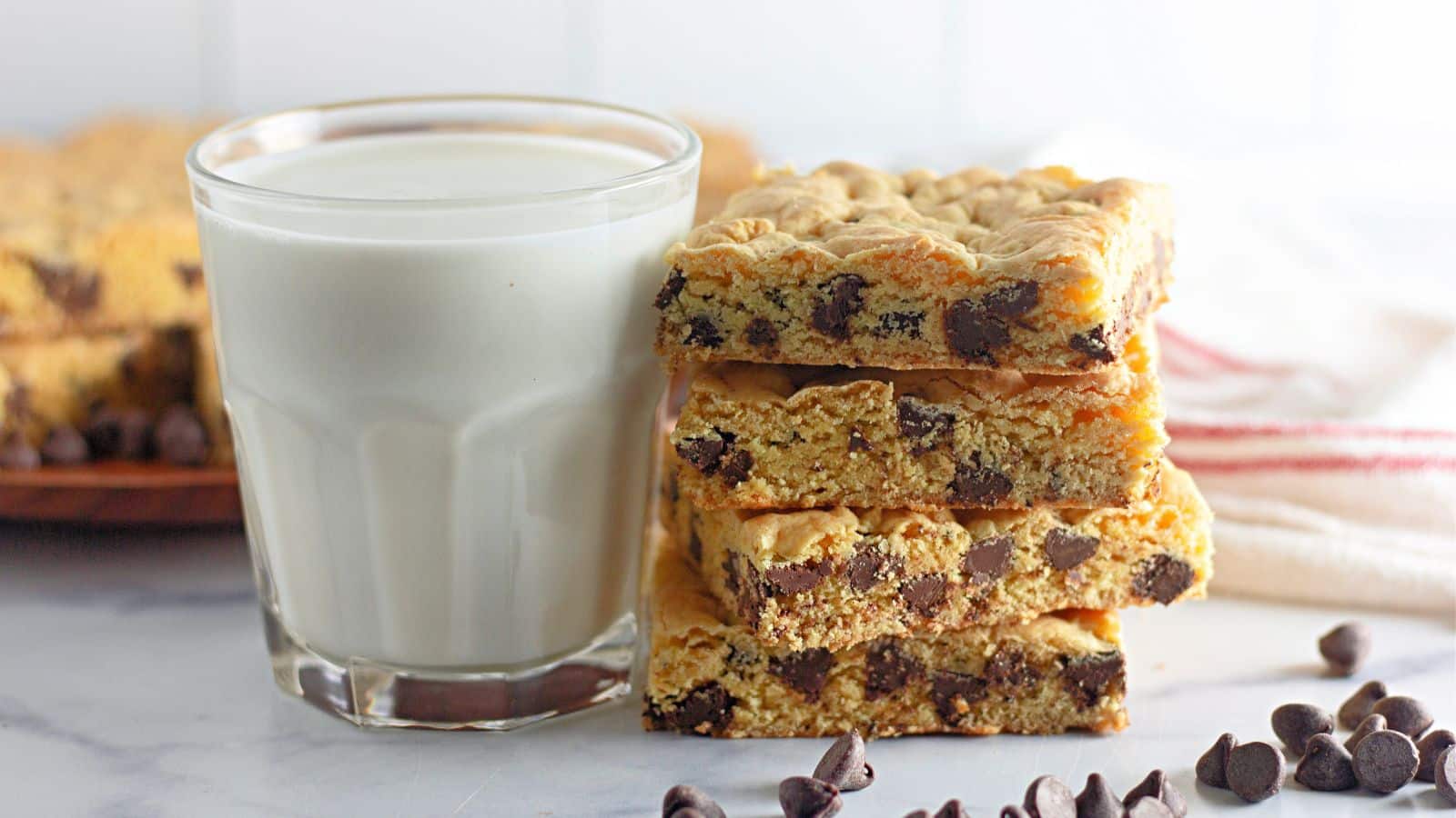 Four cake mix cookie bars on a counter.