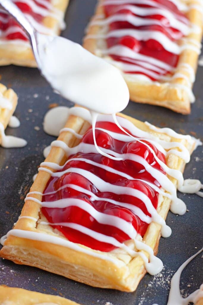 Drizzle being added on top of dessert.