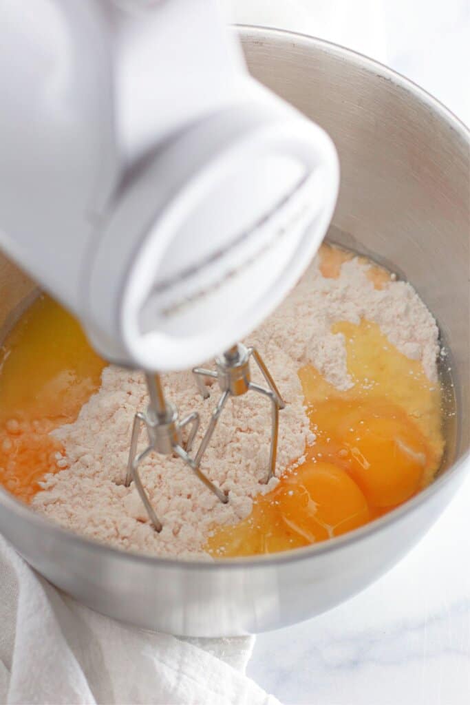 Cake mix and eggs and added to a mixing bowl.