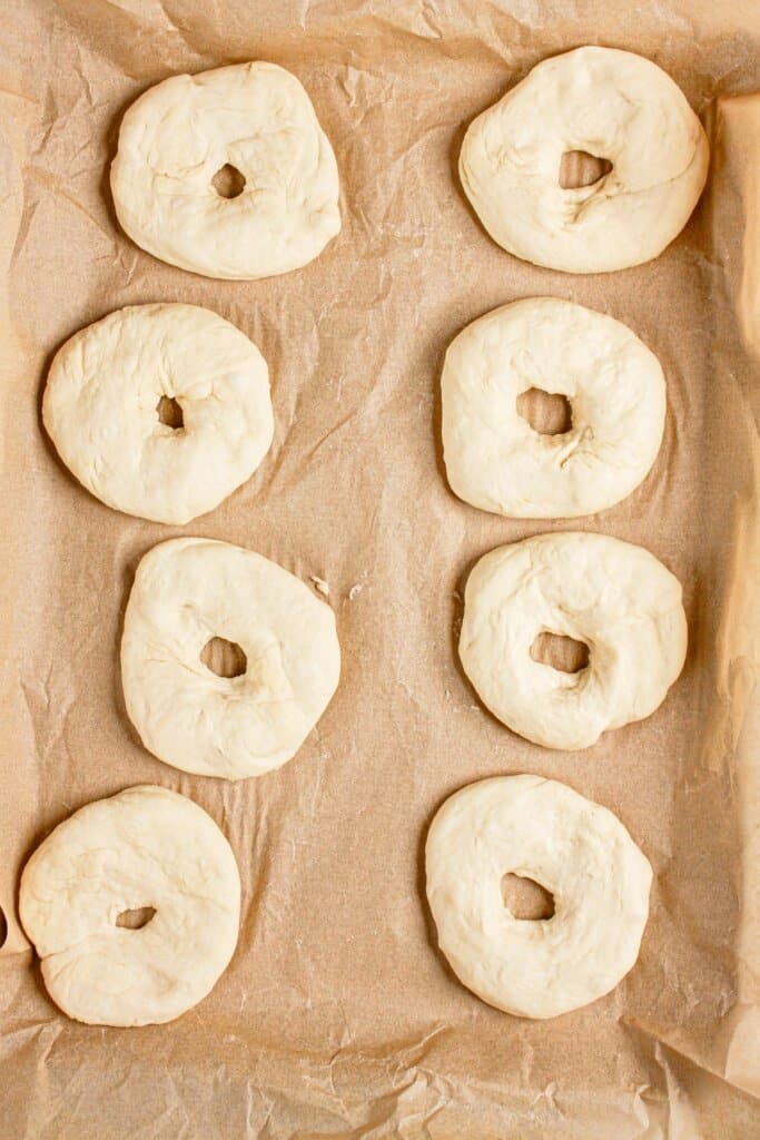 Dough with the center removed on a baking dish.