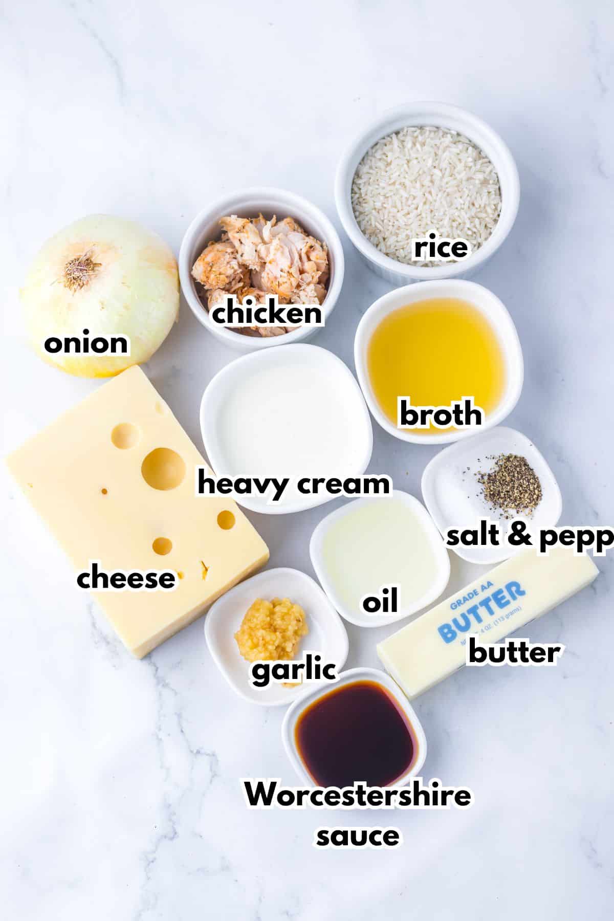 Bowls of ingredients labelled with text on a counter.