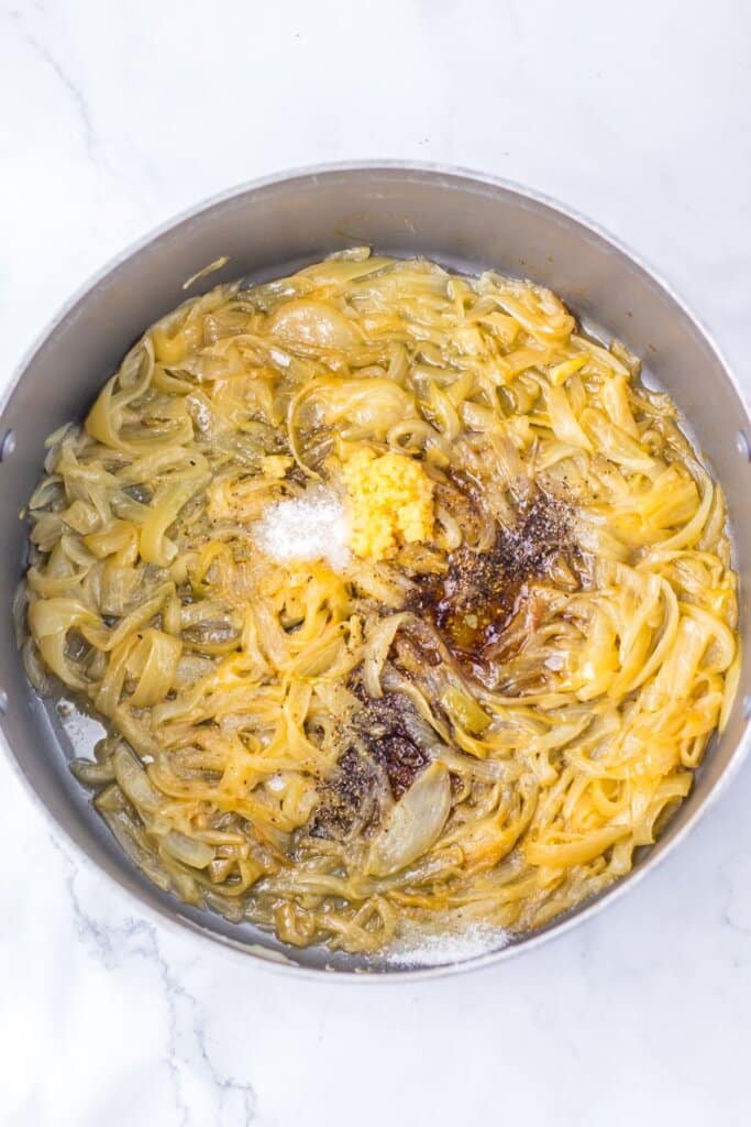 Onions, garlic, salt and pepper in a large pot.