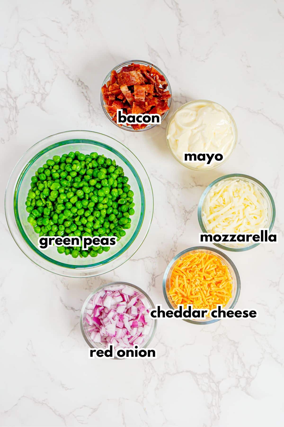 Bowls of ingredients on a counter ready to cook.